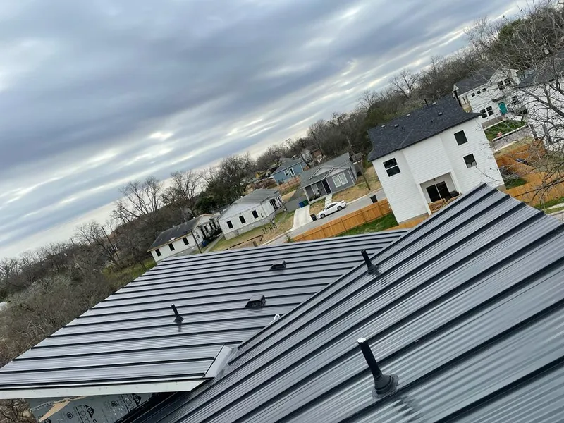 Standing seam metal roof panels with vents for Skylight Repair in Portland